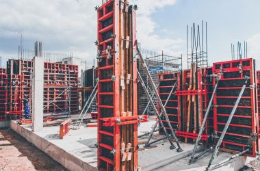 Red column formwork erected on a construction site