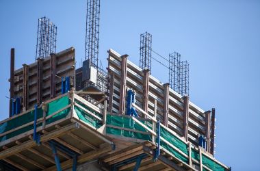 Formwork and scaffolding at the edge of a concrete slab under construction